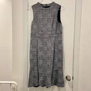 SOLD Black and white checkerd midi dress with ruffled bottom